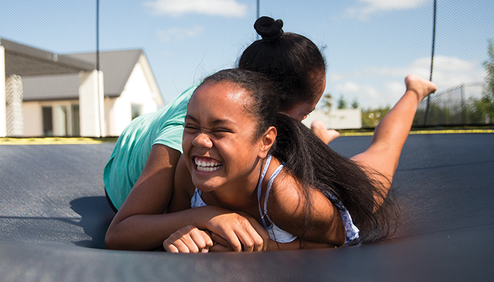girls having fun in a trampoline
