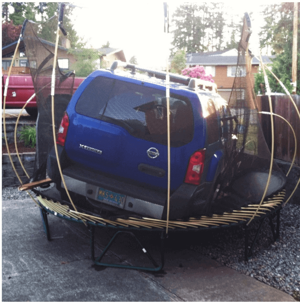A mid-sized SUV on a Springfree Trampoline.