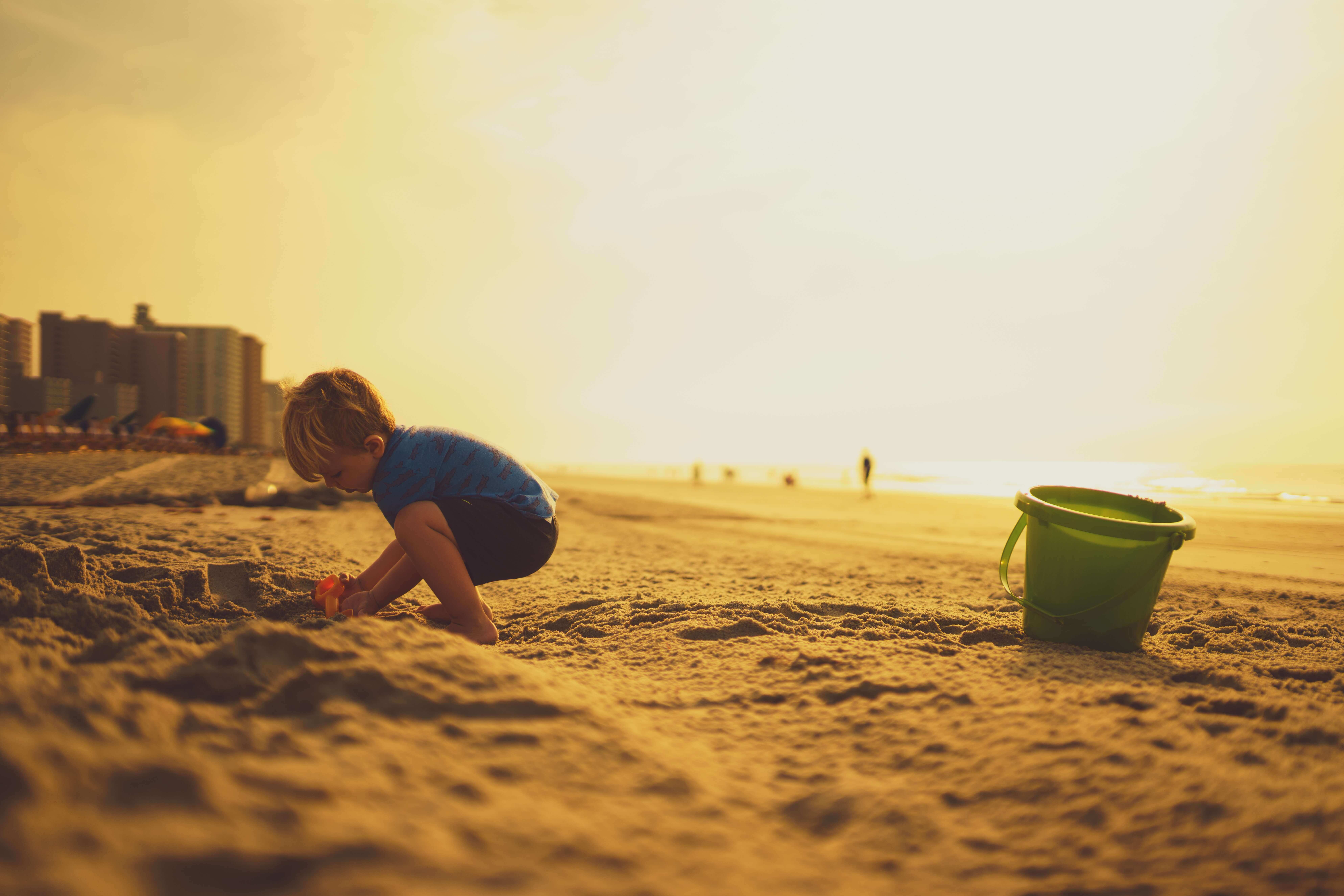 a boy making Sandcastles